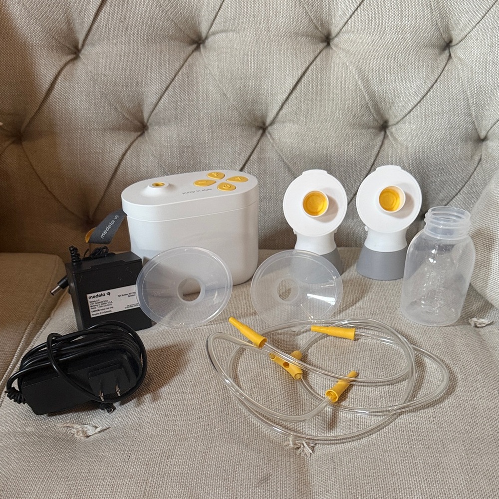 Medela Electric Breast Pump Set in White and Yellow